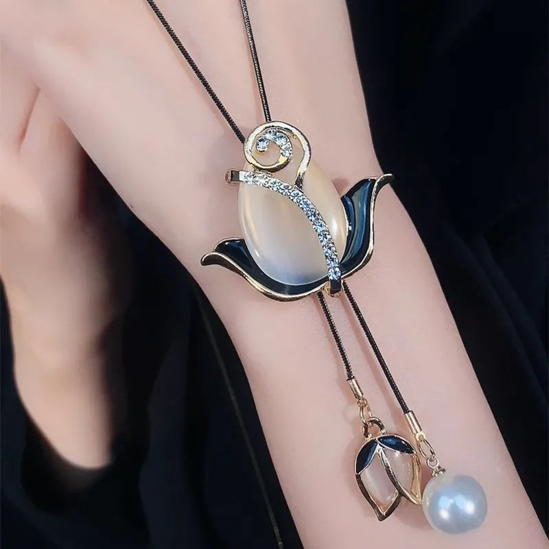 ✨【Limitált ajánlat – Akár 50% kedvezmény】🌷Elegáns hosszú nyaklánc macskaszem kővel, tulipán formában, divatos és figyelemfelkeltő