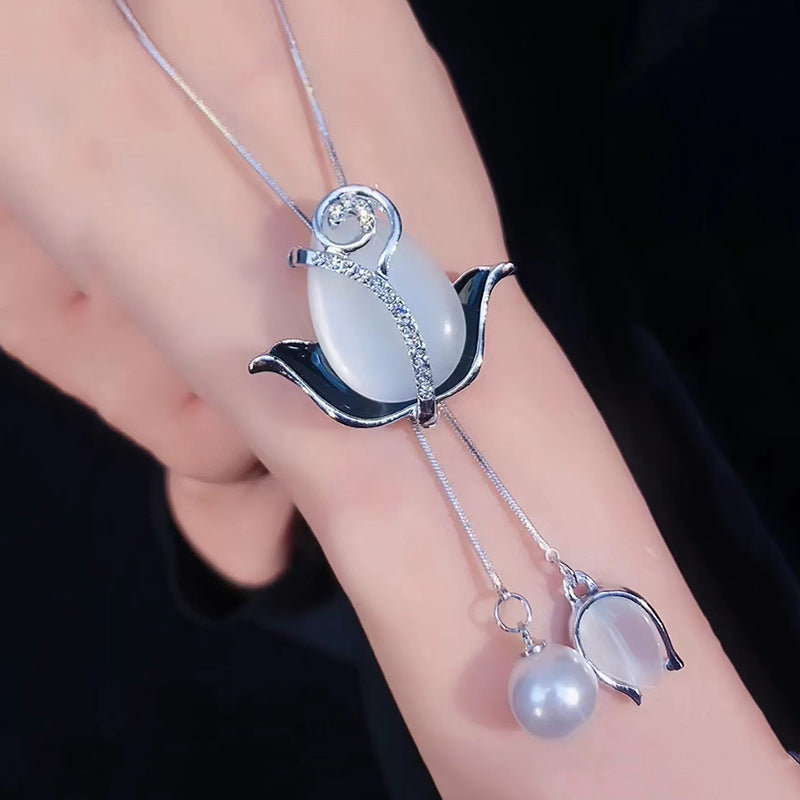 ✨【Limitált ajánlat – Akár 50% kedvezmény】🌷Elegáns hosszú nyaklánc macskaszem kővel, tulipán formában, divatos és figyelemfelkeltő
