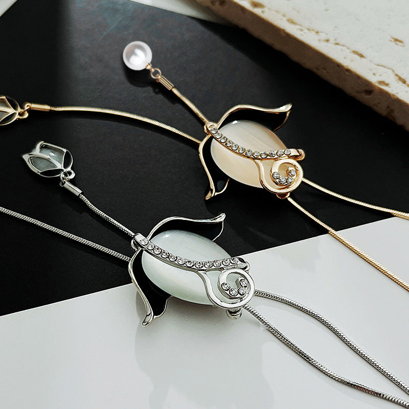 ✨【Limitált ajánlat – Akár 50% kedvezmény】🌷Elegáns hosszú nyaklánc macskaszem kővel, tulipán formában, divatos és figyelemfelkeltő